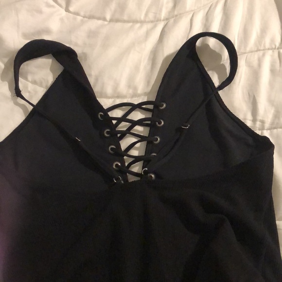 Never worn black once piece bathing suit. - Picture 3 of 6